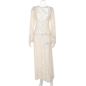 Detail of sheer lace long sleeve maxi dress with delicate floral mesh and scalloped edges