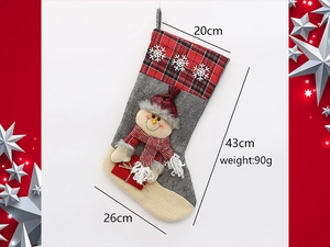 Detail showing Christmas stocking dimensions 20x43cm with snowman and snowflake patterns