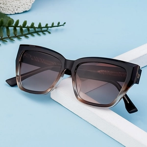 Fashionable oversized square cat eye sunglasses with gradient brown lenses and frame