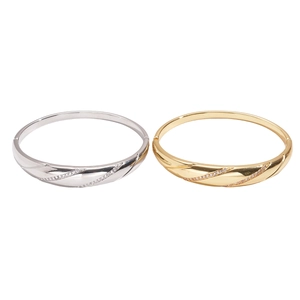 Minimalist 18k gold plated bangle with diagonal zircon inlay in gold and silver finish