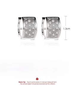 Detailed view of silver hoop earrings with diamond pavé and S925 engraved stamp