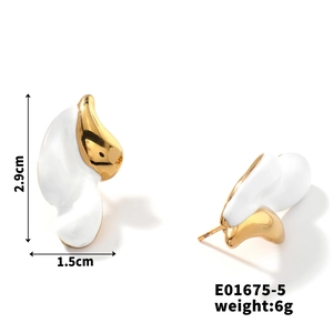 Macro detail of gold and white teardrop earrings with dimensions 2.9cm by 1.5cm