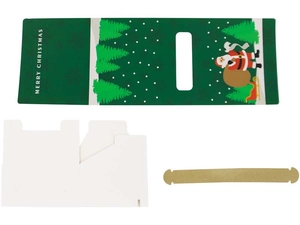 Flat lay of Christmas gift box components including green Santa cover and gold handle