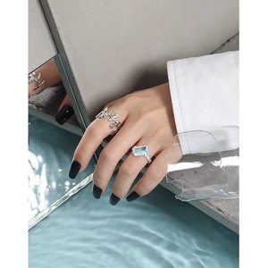 Minimalist S925 sterling silver liquid metal ring set with blue zircon gemstone