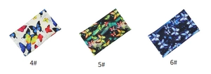 Detailed close-up showing three elastic butterfly print headbands in different colors