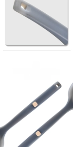 Macro shot of grey silicone-wrapped handle on kitchen spatula for heat resistance