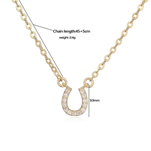 Elegant gold horseshoe pendant necklace with cubic zirconia and 45+5cm adjustable chain