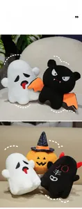 Detail view of plush Halloween ghost, devil, and pumpkin pillows with soft sherpa texture