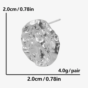 Macro shot of silver round irregular textured earrings with size 2.0cm and weight 4.0g details