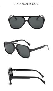 Detail view of black pilot polarized sunglasses with double bridge and large frame