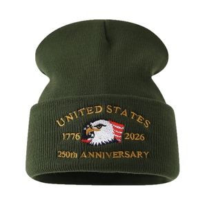 Dark green beanie featuring US Marine eagle embroidery for the 250th anniversary