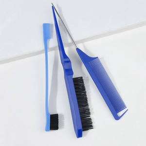 Close-up of blue 3-piece hair styling set including bristle brushes and steel tail comb
