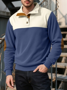 Detail of color-block knit sweater with ribbed texture and three-button placket