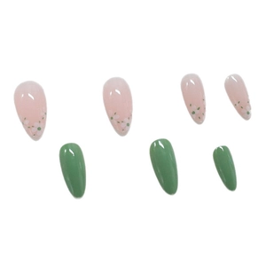 Glossy almond fake nails with minimalist white floral design and sage green solid finish