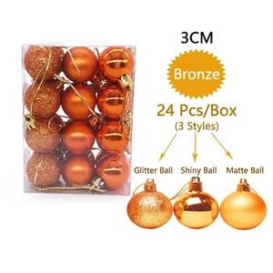 Detail of 3cm bronze Christmas balls set showing glitter, shiny, and matte finishes