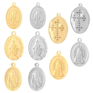 Religious stainless steel oval pendants with embossed cross and Mary designs in gold and silver