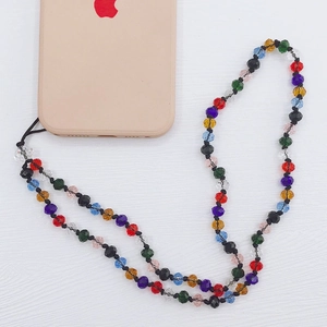Detailed view of handmade colorful crystal bead phone lanyard with various faceted stones
