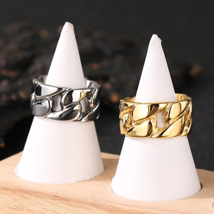 Men's stainless steel Cuban link rings in gold and silver finish on white stands