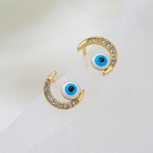 Minimalist irregular crescent moon and blue evil eye stud earrings with zircon inlay