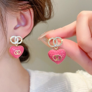 Elegant gold plated pink enamel heart drop earrings with sparkling zircon crystals
