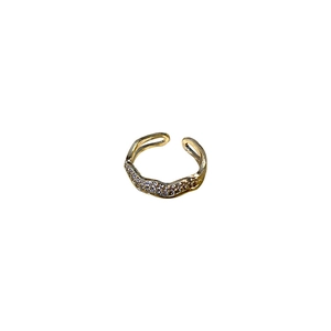 Gold plated wavy open ring featuring sparkling micro-pave crystals on irregular band