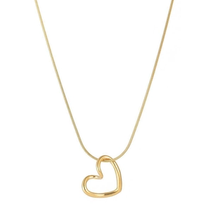 Elegant gold heart pendant necklace with delicate snake chain in a minimalist style