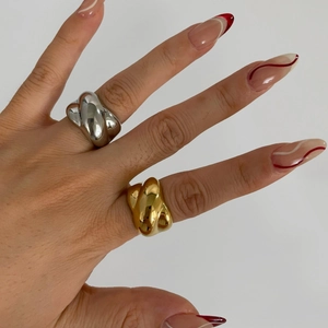 Polished chunky twisted stainless steel rings in gold and silver for women