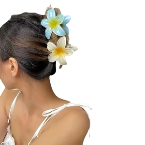 Summer plumeria flower hair claw clips in blue and white colors for vacation styling