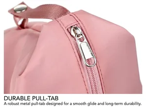 Close-up detail of smooth metal zipper and durable handle on pink gym travel bag