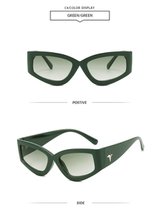 Deep green cat eye sunglasses with silver star detail and gradient lenses shown in detail