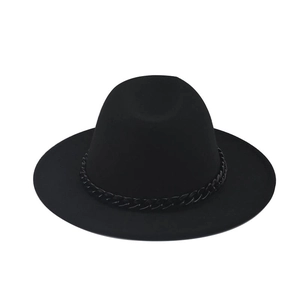 Detail of a black wool felt fedora featuring a stylish thick black chain decorative band