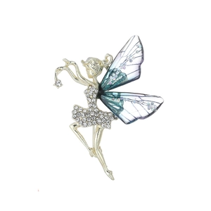 Sparkling ballet fairy brooch with gold plating and blue gradient wings for coats