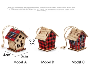 Detail view of rustic wooden Christmas houses with plaid fabric accents and jute rope