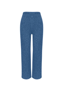 Detail of blue ribbed knit straight-leg trousers with soft texture and premium finish