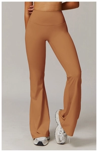 Close-up of high-waisted flared yoga pants in khaki brown with smooth matte fabric
