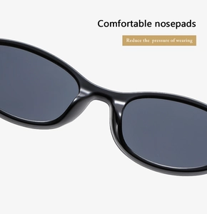 Détail des plaquettes de nez confortables sur lunettes de soleil noires pour moins de pression