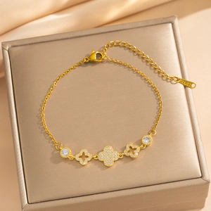 Luxurious gold stainless steel four-leaf clover bracelet with pave zircon inlay