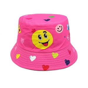Close-up of pink bucket hat featuring smileys, hearts, and reinforced stitching lines