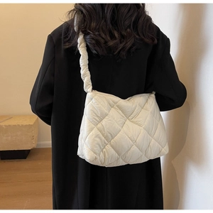 Quilted oversized shoulder bag in off-white nylon with textured rhombohedral stitching details