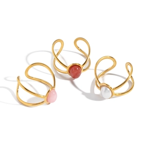 Set of three vintage 18K gold plated oval natural stone open rings in pink and white
