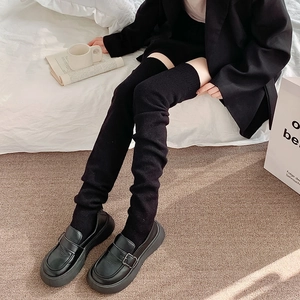 Japanese style black over-the-knee knit socks for women with ribbed texture and thick cotton