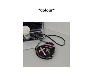 Gothic black heart-shaped crossbody bag with pink cross and 'Baby Baby' text detail