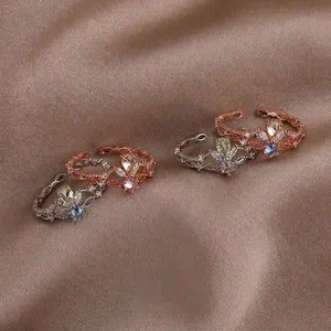 Adjustable crown rings set with colorful teardrop gemstones and rose gold finish