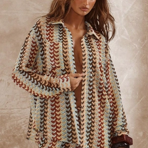 Women's oversized knit shirt with colorful wave pattern and bohemian loose silhouette