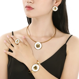 Luxurious gold stainless steel jewelry set with white circular pendants for women