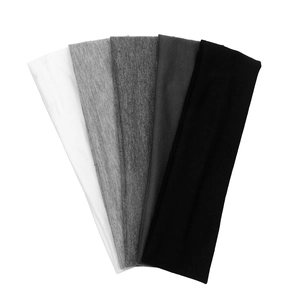 Detail view of five gradient workout headbands from white to black in a fan layout