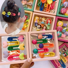 Detailed view of colorful hair clip sets with diverse shapes for toddlers and kids