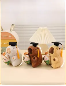 Capybara plush toys with graduation caps in white brown and beige colors