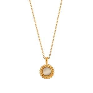 Retro golden necklace featuring a sunburst pendant with light stone on white background