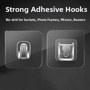 Close-up of interlocking self-adhesive snap hooks for screwless wall mounting and hanging